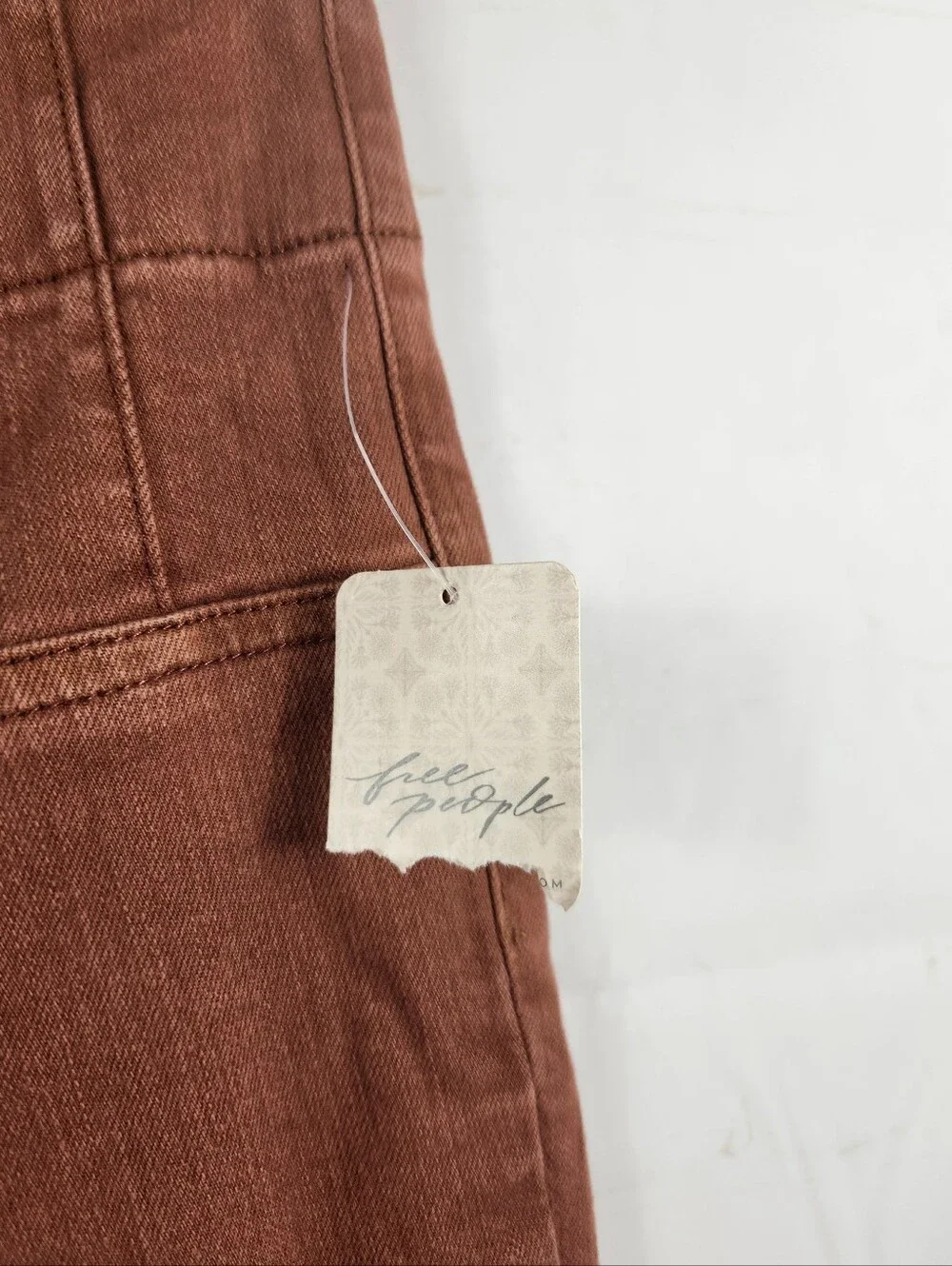 Free People We The Free Jayde High Rise Flare Jeans Rust Brown Size 32 NWT
